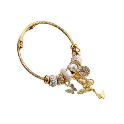 Εικόνα της Βραχιόλι χρυσό ατσάλι με πεταλούδα και charms