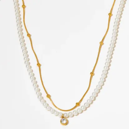 Εικόνα της Κολιέ ατσάλι με χρυσή αλυσίδα πέρλες και zircon