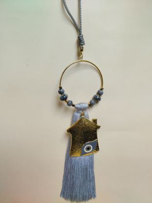 Εικόνα της ΚΡΕΜΑΣΤΟ ΓΚΡΙ ΓΟΥΡΙ ΜΕ ΣΠΙΤΑΚΙ ΜΑΤΑΚΙ