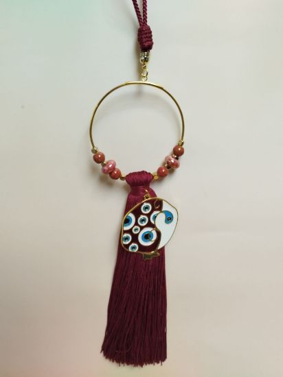 Εικόνα της ΚΡΕΜΑΣΤΟ ΓΟΥΡΙ ΜΕ ΚΟΚΚΙΝΟ ΡΟΔΙ