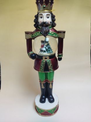 Εικόνα της ΚΑΡΥΟΘΡΑΥΣΤΗΣ ΜΕ ΧΙΟΝΟΜΠΑΛΑ ΣΤΗ ΜΕΣΗ